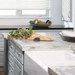 This edgy concrete countertop adds personality to a kitchen.