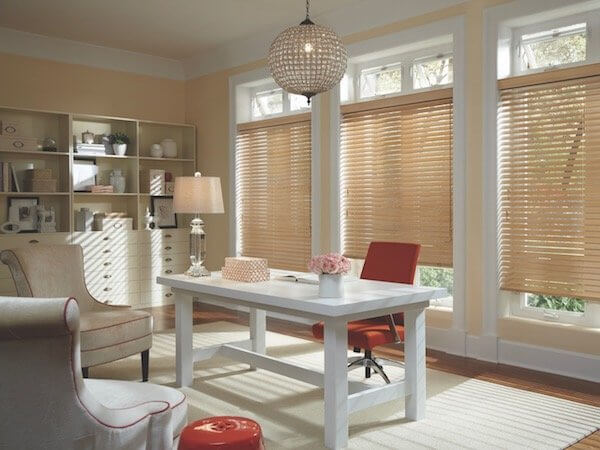 Red accents enliven this office. Shown with Parkland® Classics™ Wood Blinds.
