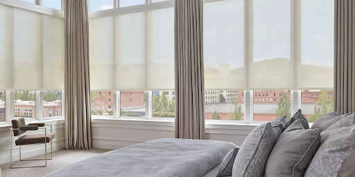 Designer Roller shades on a large window in Massachusetts