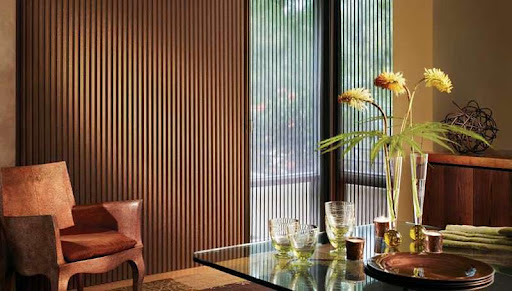 Vertical Duette Honeycomb blinds on a large window.